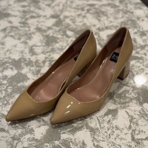Nude Patent Leather Pumps